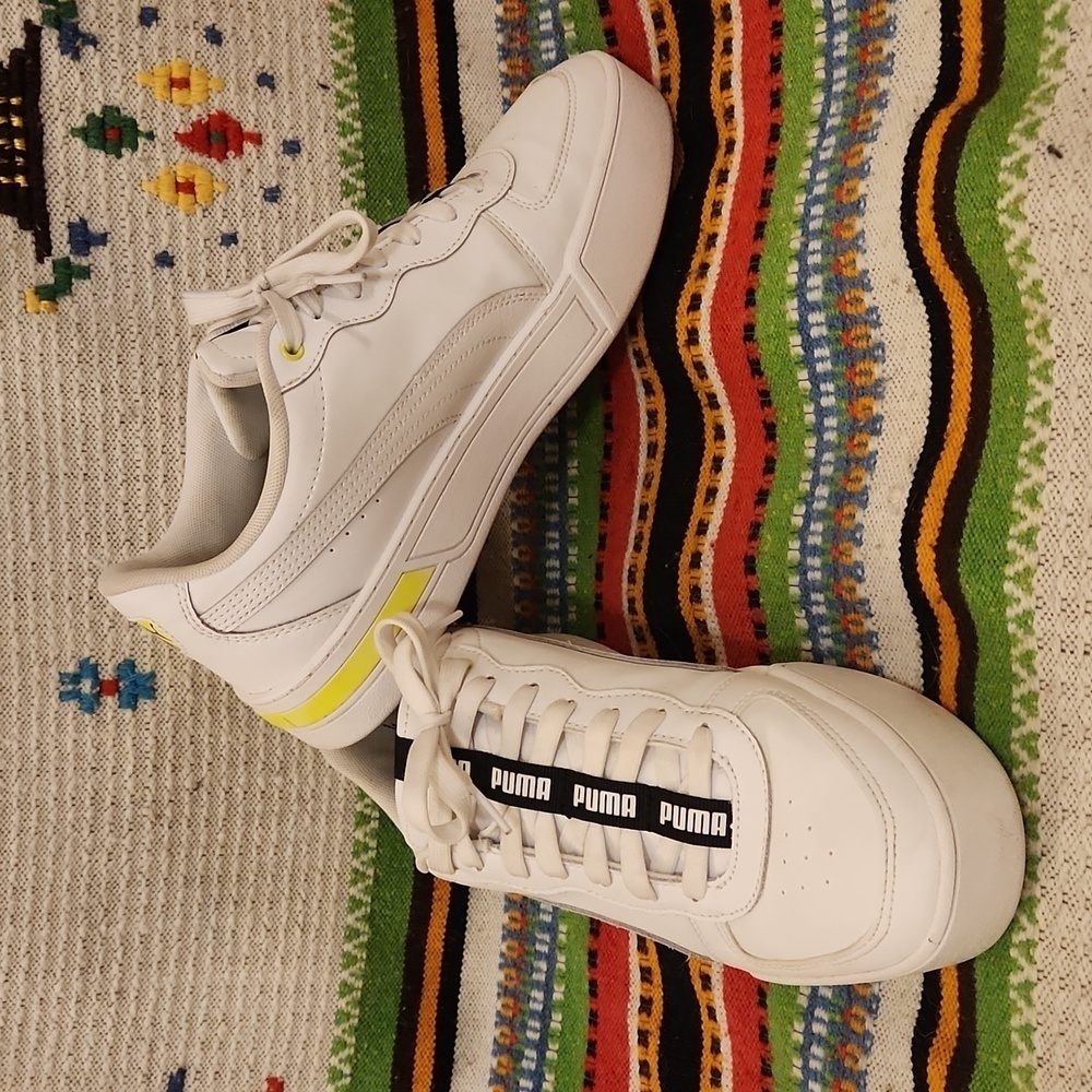 Women’s Puma Skye Tape 9.5 White Sneaker with Neon Yellow accents.